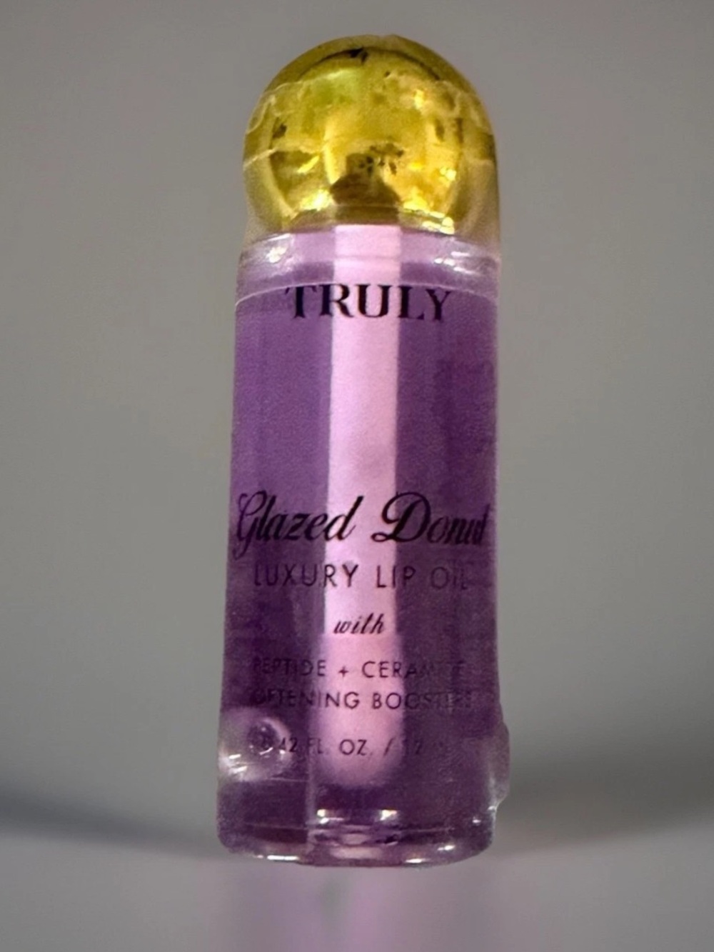 TRULY Glazed Donut Luxury Lip Oil -Purple Plum. Lip plumping. Sealed.
